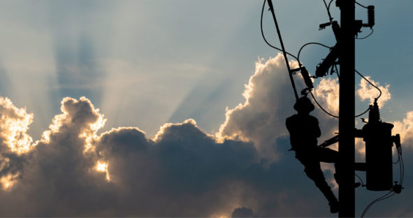 Lineman on a electrical pole