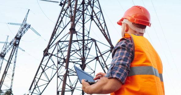 Electrical engineer working on a laptop.