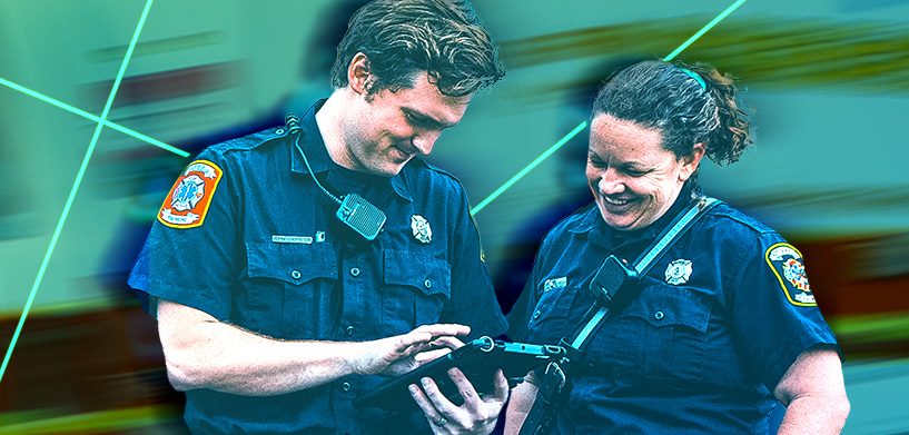 Public safety responders working on a tablet