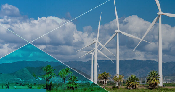 three wind turbines in front of the ocean and a partly cloudy sky, with a blue filter over the whole picture